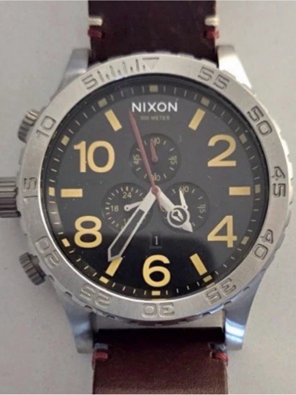 Nixon 51-30 Black Dial Watch with Gold Markers and Brown Leather Strap. Chrono.